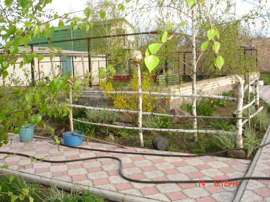 Продаж 2 поверхового будинку з гаражем і ділянкою.