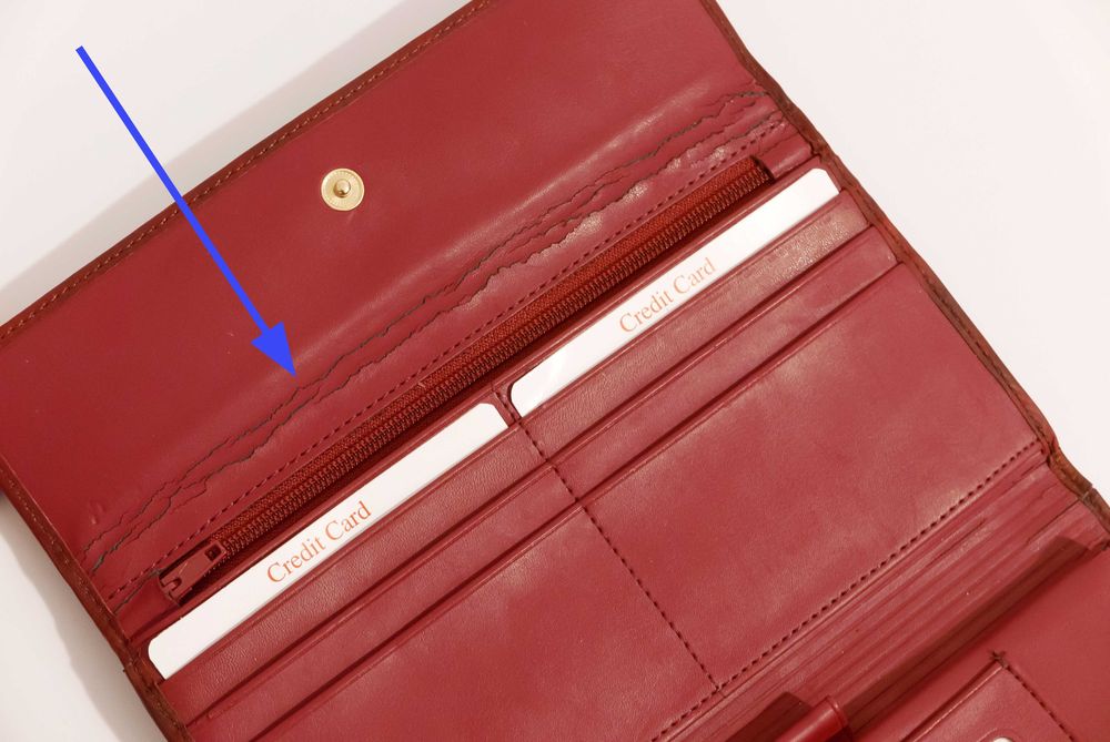 Duży skórzany portfel damski. Miękka, bordowa skóra.