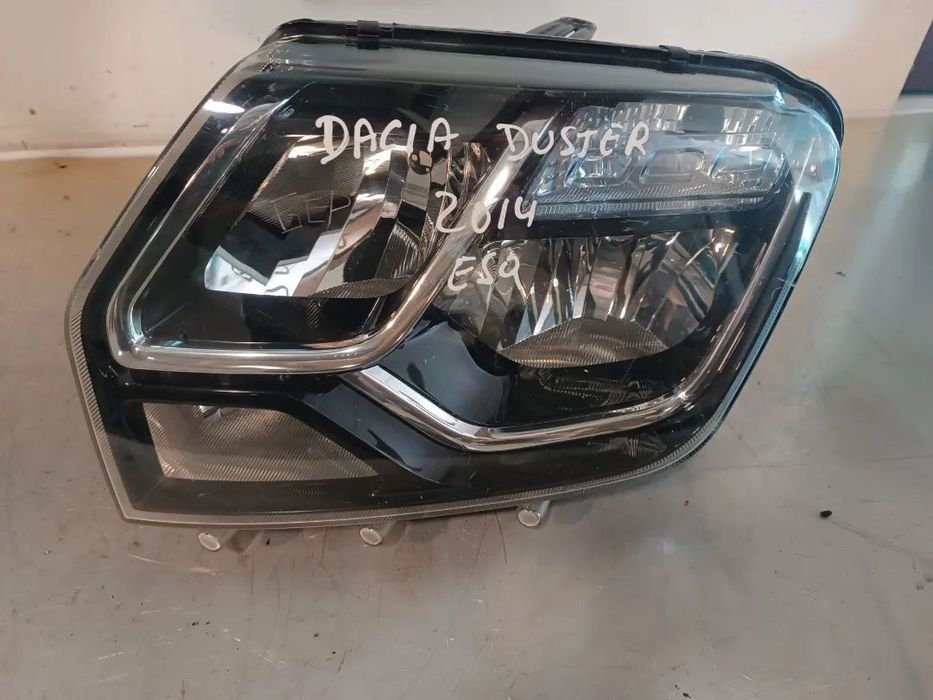 ÓTICA / FAROL DACIA DUSTER - ESQUERDO