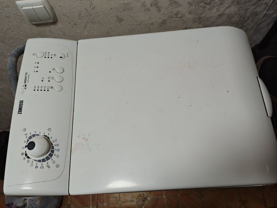 Продам вертикальну пральну машину