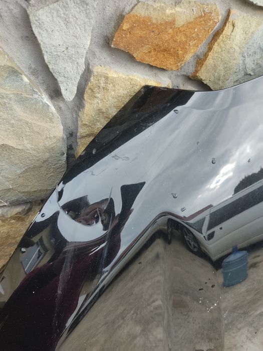 Капот BMW X1 U11 з дефектом