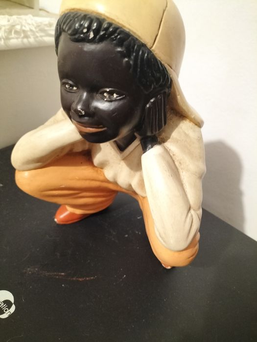Boneco de porcelana antigo