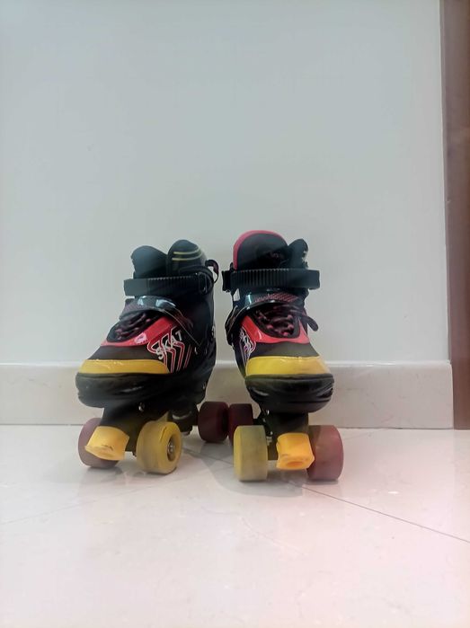 Patins de criança (inclui capacete)
