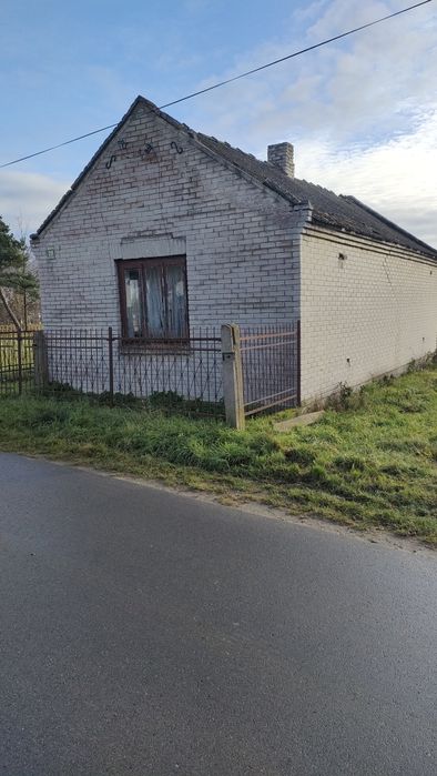 Dom drewniany obmurowany