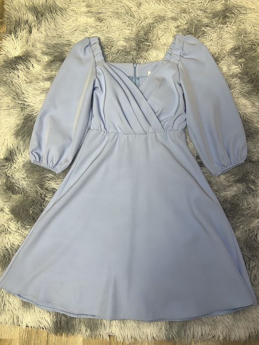 Блакитна сукня дуже гарного фасону