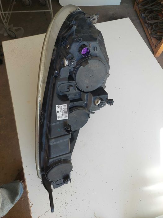 farol esq fiat doblo