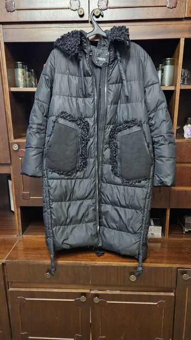 Продам пуховик большого размера.