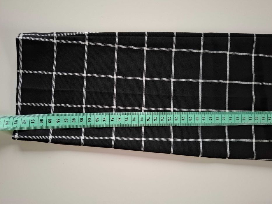 Spodnie materiałowe w kratkę Orsay 36