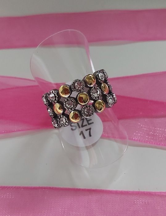 Anel bicolor, em aço, com zirconias. T17