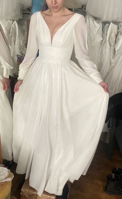Продам весільну сукня 48 розміру