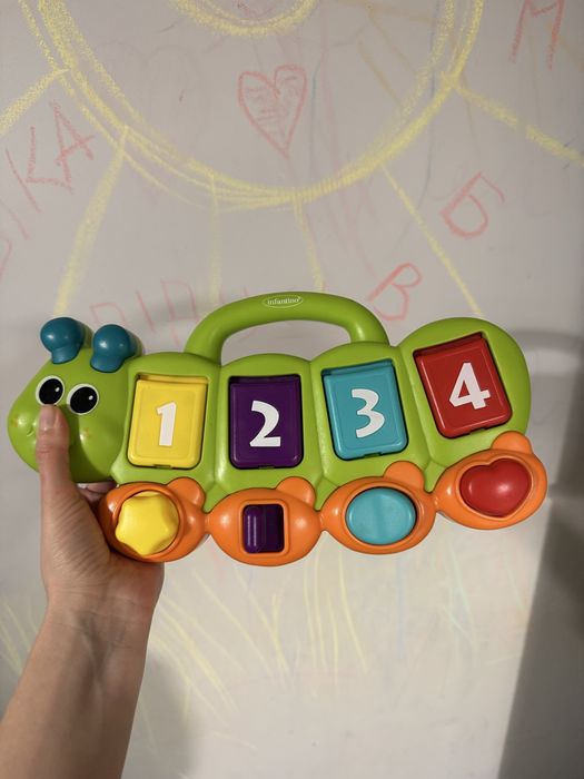 Іграшка гусінь музична INFANTINO