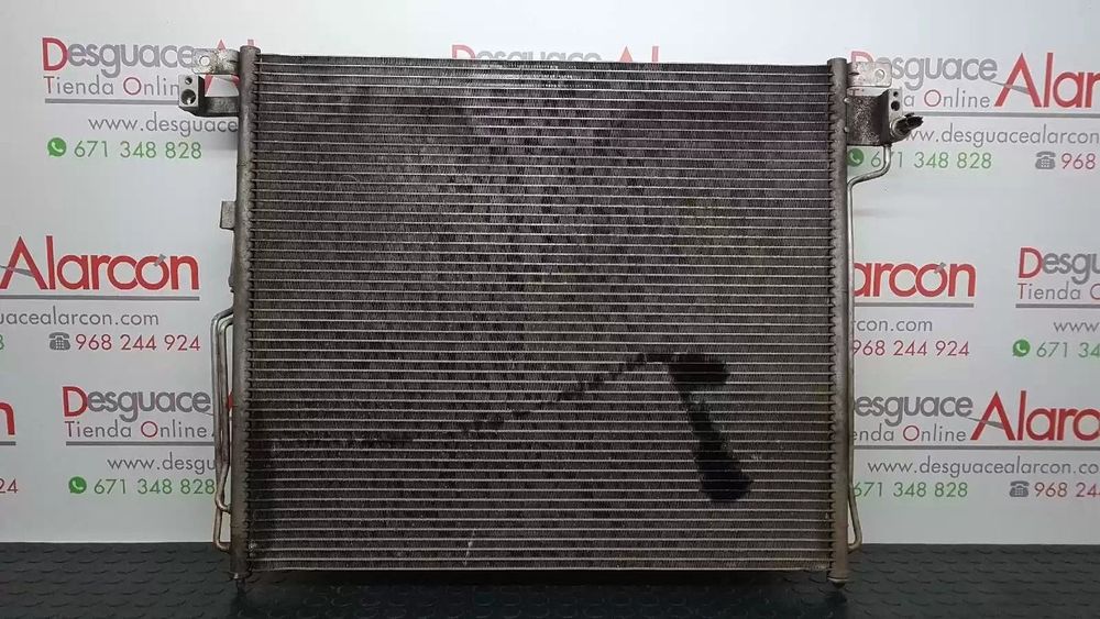 CONDENSADOR / RADIADOR AR CONDICIONADO NISSAN NP300 NAVARA 2007 -92100EB01A