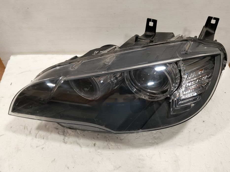 Ótica BMW x6 bi-xenon ref. 1ZS009645-01/AH