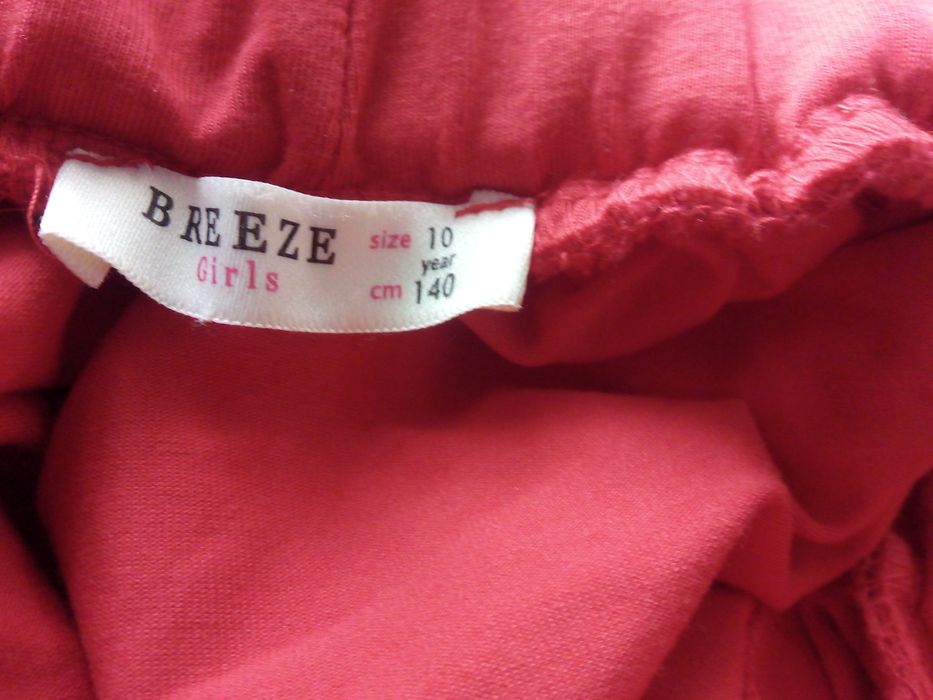 Śliczna elegancka malinowa spódniczka 122-128