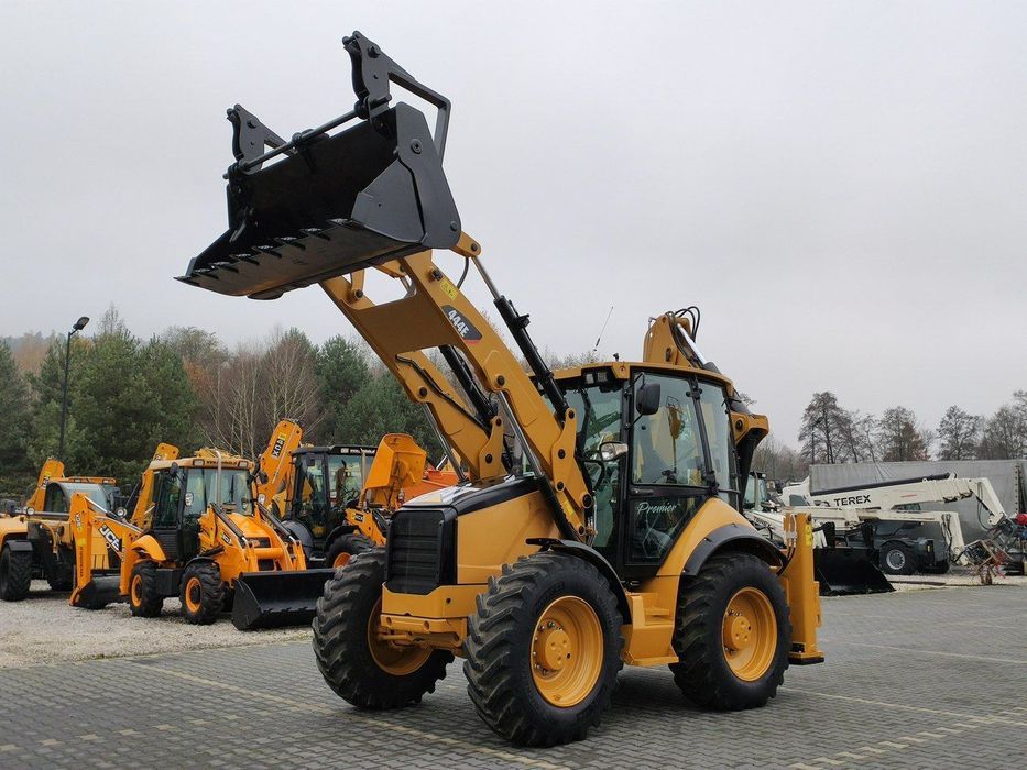 Caterpillar 444E Premier Sterowanie na Joystickach FULL OPCJA  Cały po Tulejowaniu Klima Dodatkowe Wyjścia Szybko-Złącze Przód/Tył