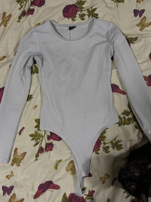 Продається жіноче боді білого кольору