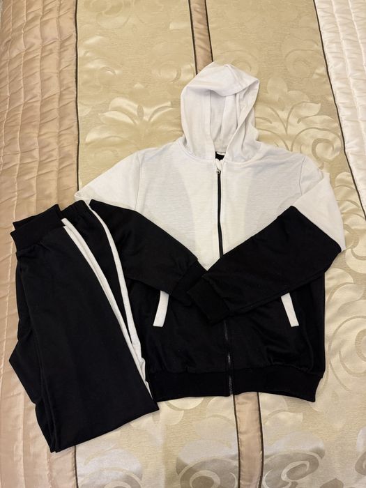 Dres chłopięcy biało-czarny 160 cm