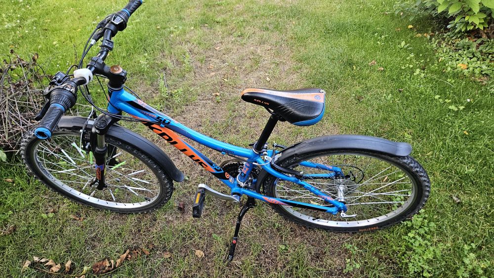 Rower młodzieżowy Kellys Kiter 24" – amortyzator, Shimano, błotniki