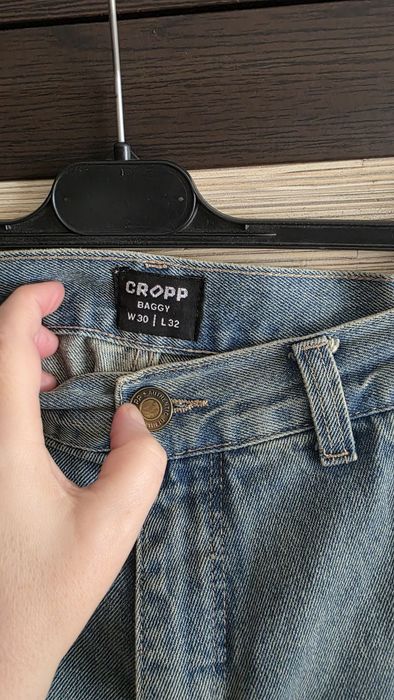 Spodnie jeansowe Cropp  30/32.