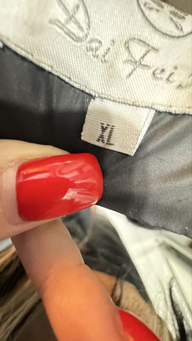 Пуховик / зимня курточка