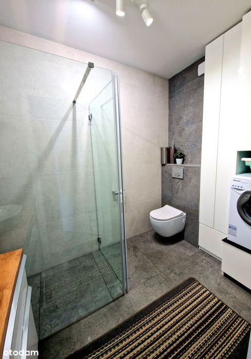 Przestronne mieszkanie z balkonem i garażem w apartamentowcu
