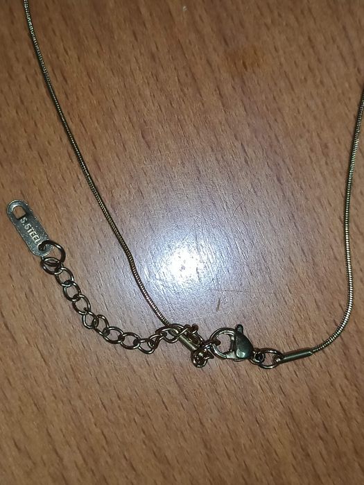 Colar em aço olho turco  com pérolas NOVO