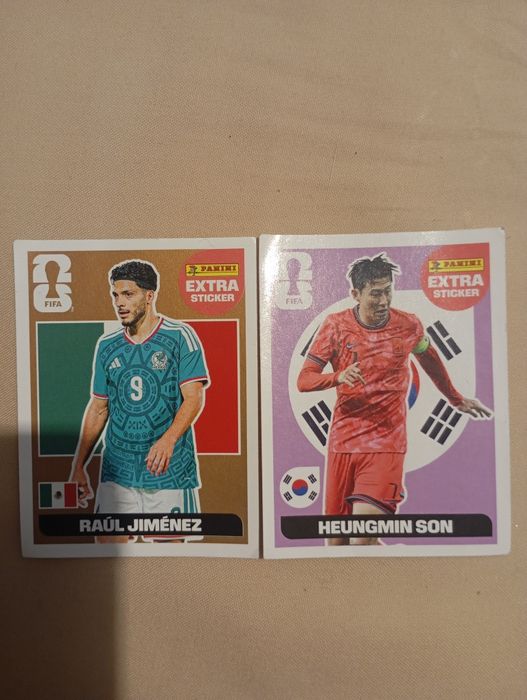 Cromos Legends lilás e bronze