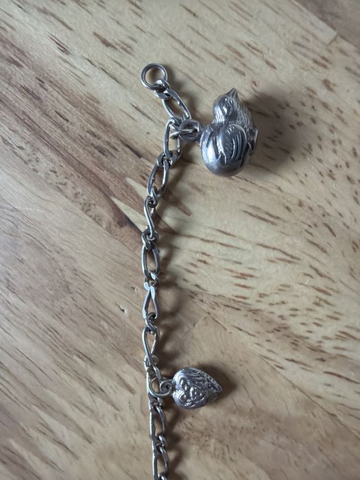 Pulseira com berlocos de prata