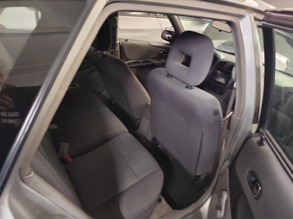 Mazda 323f 1.3 gasolina 2003