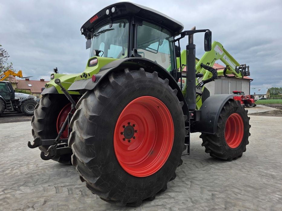 Claas Arion 620 z ładowaczem czołowym Ares Axion