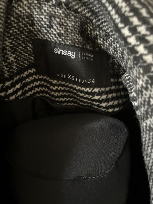 Jesienny płaszcz w kratę