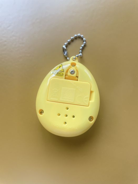 Bichinho Virtual Amarelo -  Estilo Tamagotchi