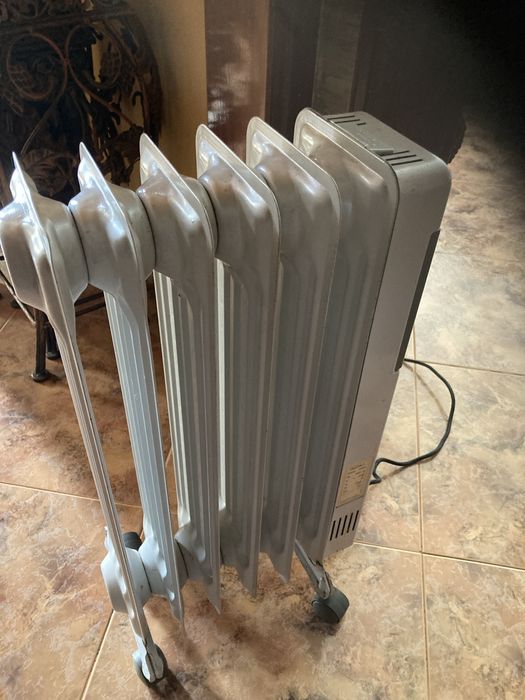 Aquecedor Junex em bom estado de funcionamento