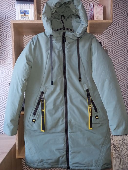 Продається пуховик. В ідеальному стані. Розмір 52-54 повномір.