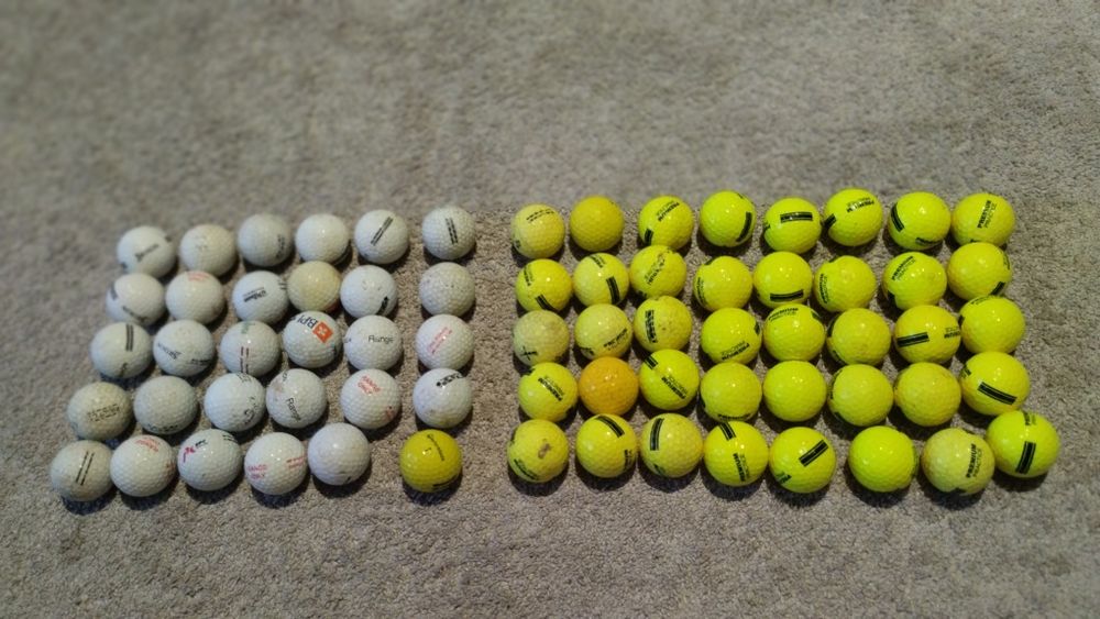 Lote de 70 bolas de golfe.