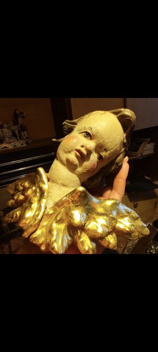 Głowa  anioła z drewna cherubin putto