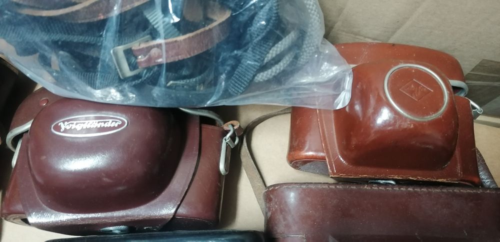 Conjunto bolsas couro máquinas fotográficas