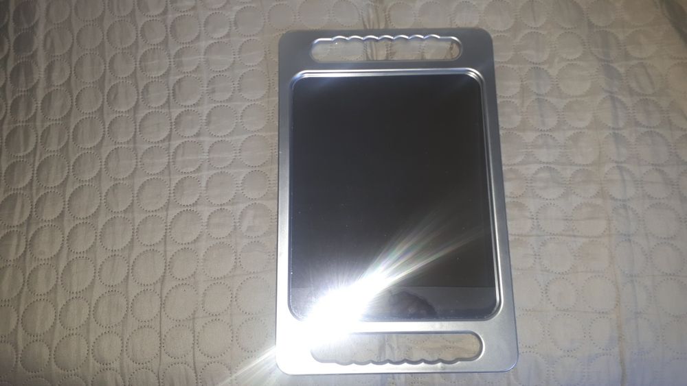 Espelho de cabeleira.