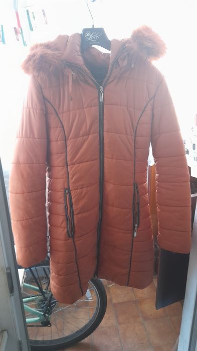 Оранжевый женский пуховик