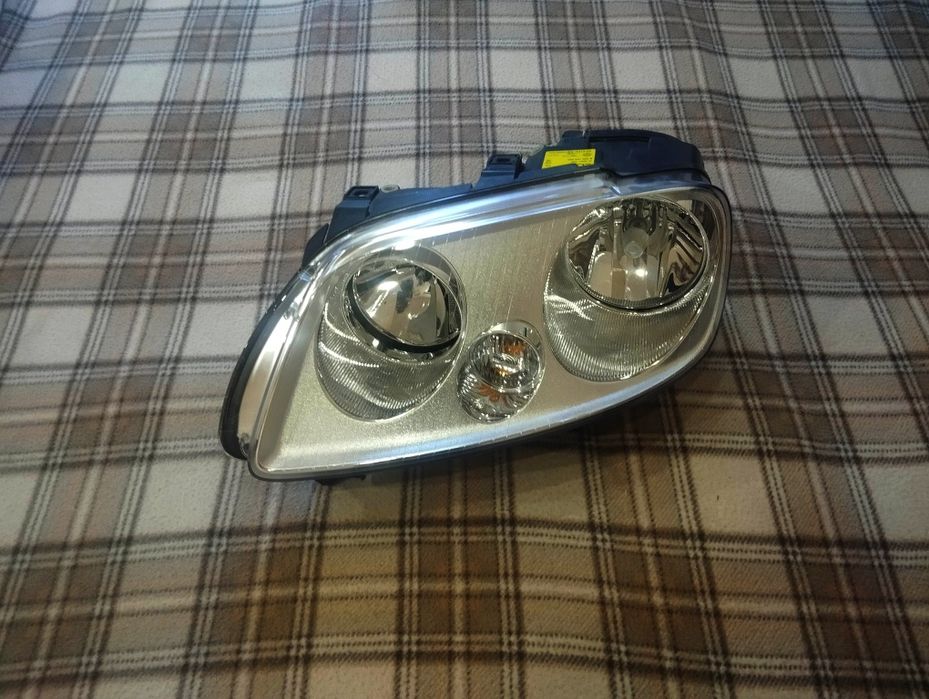 Фара передня ліва Volkswagen caddi.