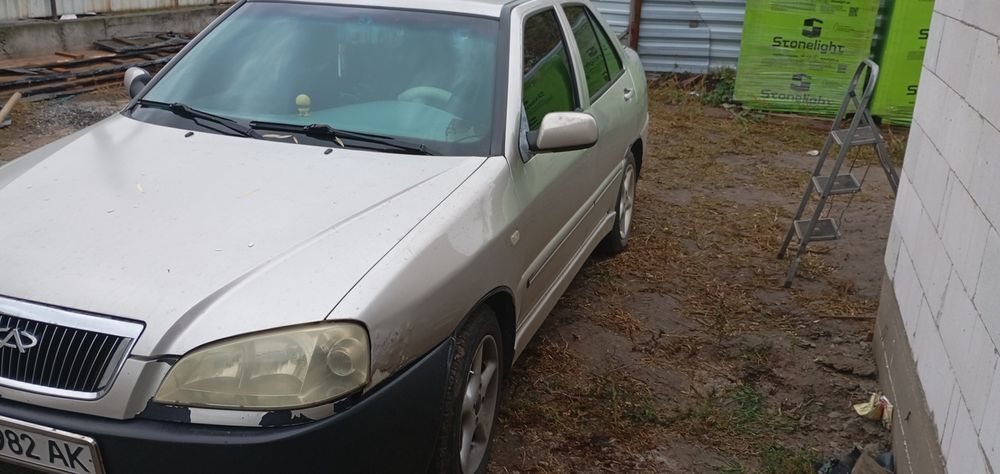 Чері Амулет                   .