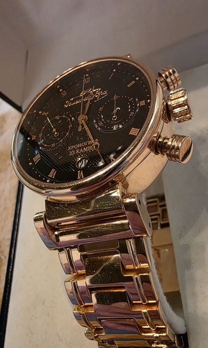 Золотые часы с браслетом