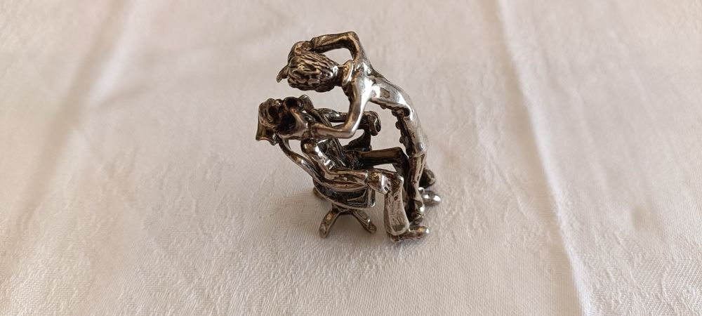 Escultura em prata da profissão de dentista