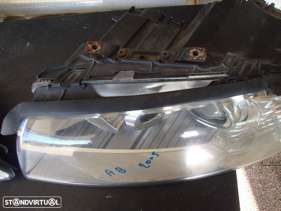 farois xenon direcionais Audi A8  pre-facelift grelha pequena