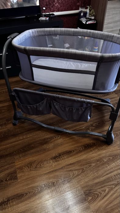 Ліжко-качалка, укачуючий центр