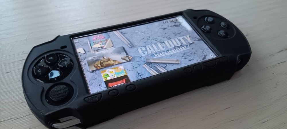 PSP(+200jogos)+protecção de silicone+bolsa