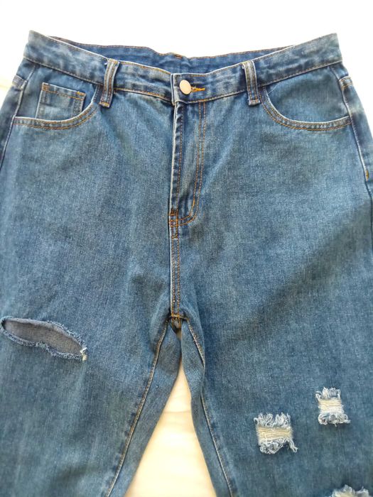 Новые джинсы с дырками
