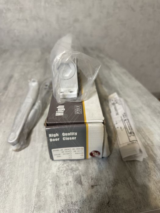 Доводчик для двері