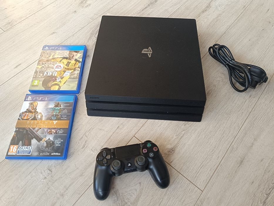 Konsola Ps4 Pro 1tb pad bezprzewodowy 2 gry
