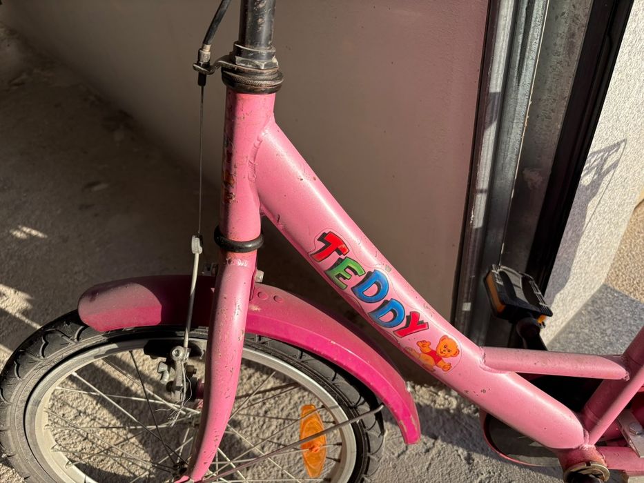 Bicicleta rosa infantil